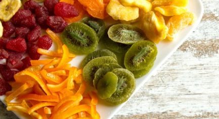 Selection of colorful dried fruits on a plate